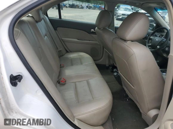 2012 Ford Fusion Hybrid с VIN 3FADP0L35CR184476, выставлен на аукционе Copart как лот 63907885 с пробегом 230 589 миль миль и Списание • Salvage title. История ставок и продаж доступна на DreamBid. Изображение 10.