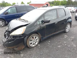 2009 Honda Fit Sport with VIN JHMGE88469S055316, listed as a IAAI auction lot 42306333 with 144,377 mi miles and . Bid and sale history available at DreamBid. Image 2.