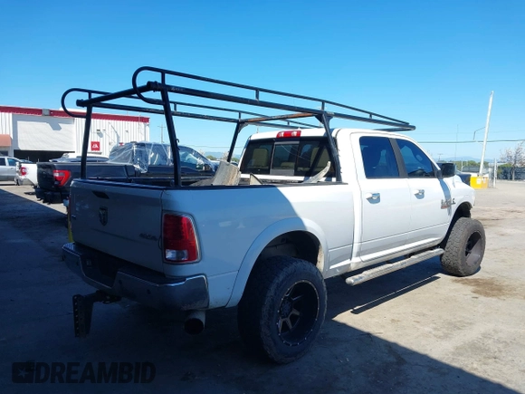 2014 Ram 2500 Laramie with VIN 3C6UR5FL0EG121515, listed as a IAAI auction lot 41859142 with 225,048 mi miles. Bid and sale history available at carsss.com. Image 4.