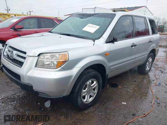 2007 Honda Pilot LX with VIN 2HKYF18157H530370, listed as a IAAI auction lot 41967033 with 214,590 mi miles and . Bid and sale history available at DreamBid. Image 17.