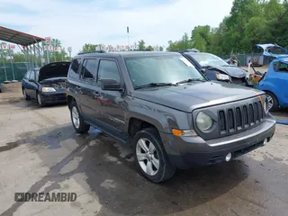 2014 Jeep Patriot Latitude with VIN 1C4NJRFB3ED847997, listed as a IAAI auction lot 42109140 with 121,299 mi miles and . Bid and sale history available at carsss.com. Image 1.