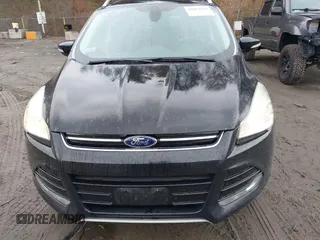 2014 Ford Escape Titanium with VIN 1FMCU9J99EUD38866, listed as a IAAI auction lot 42052579 with 202,337 mi miles. Bid and sale history available at carsss.com. Image 12.