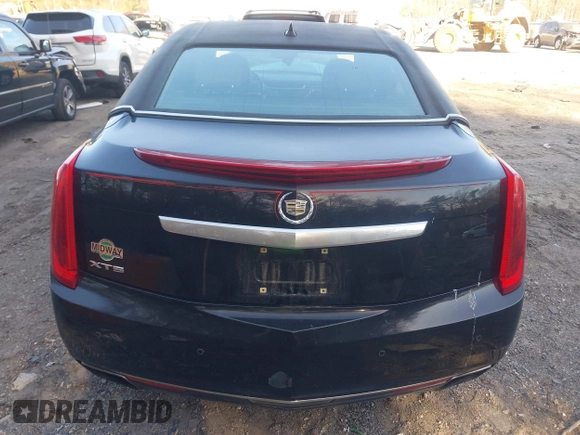 2013 Cadillac XTS Premium z VIN 2G61S5S38D9199459, wystawiony jako IAAI lot #41787638 z przebiegiem 171 298 mil mil oraz . Historia ofert i sprzedaży dostępna na DreamBid. Obrazek 16.