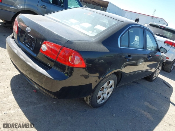 2008 Kia Optima LX with VIN KNAGE123985242231, listed as a IAAI auction lot 41838786 with 217,754 mi miles. Bid and sale history available at carsss.com. Image 4.