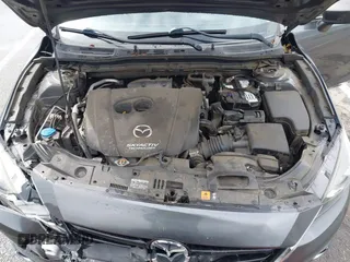 2014 Mazda 3 S Touring with VIN JM1BM1V31E1132448, listed as a IAAI auction lot 41815085 with 144,705 mi miles and . Bid and sale history available at DreamBid. Image 10.