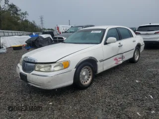 1999 Lincoln Town Car Executive z VIN 1LNHM81WXXY716663, wystawiony jako Copart lot #46622125 z przebiegiem Nie podano mil oraz Szkoda całkowita • Salvage title. Historia ofert i sprzedaży dostępna na DreamBid. Obrazek 1.