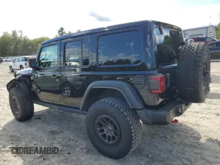 2023 Jeep Wrangler Rubicon with VIN 1C4HJXFN4PW636133, listed as a Copart auction lot 75499614 with 13,252 mi miles and Salvage title. Bid and sale history available at DreamBid. Image 2.