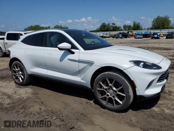 2021 Aston Martin DBX z VIN SCFVUJAW8MTV02781, wystawiony jako Copart lot #56249665 z przebiegiem 19 901 mil mil oraz Szkoda całkowita • Salvage title. Historia ofert i sprzedaży dostępna na DreamBid. Obrazek 4.