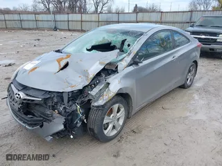 2013 Hyundai Elantra Coupe GS with VIN KMHDH6AEXDU013971, listed as a IAAI auction lot 41665698 with 222,962 mi miles. Bid and sale history available at carsss.com. Image 17.