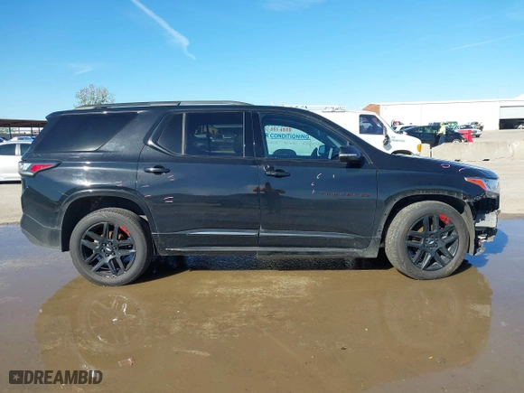 2019 Chevrolet Traverse Premier with VIN 1GNEVKKWXKJ142249, listed as a IAAI auction lot 41194959 with 101,566 mi miles. Bid and sale history available at carsss.com. Image 13.