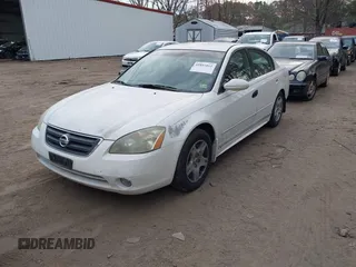 2003 Nissan Altima S with VIN 1N4AL11DX3C116530, listed as a IAAI auction lot 41885861 with 164,880 mi miles. Bid and sale history available at carsss.com. Image 2.