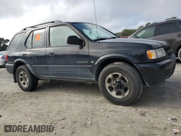 2001 Isuzu Rodeo S with VIN 4S2CK58W214338866, listed as a Copart auction lot 85280494 with 57,279 mi miles and Clean title. Bid and sale history available at DreamBid. Image 4.