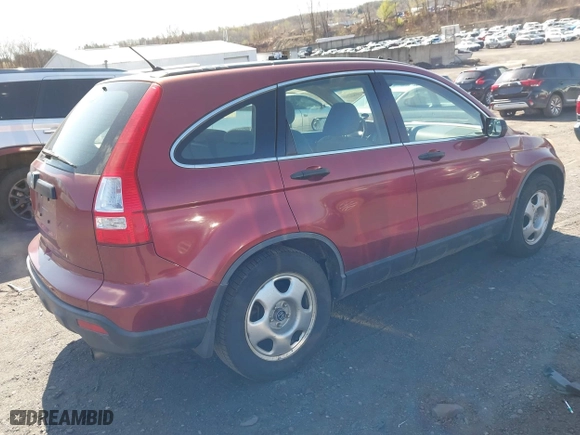2008 Honda CR-V LX with VIN JHLRE48368C071019, listed as a IAAI auction lot 42047164 with 214,536 mi miles. Bid and sale history available at carsss.com. Image 4.