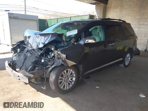 2014 Toyota Sienna XLE with VIN 5TDYK3DC5ES433949, listed as a IAAI auction lot 42095625 with 337,642 mi miles and . Bid and sale history available at DreamBid. Image 18.