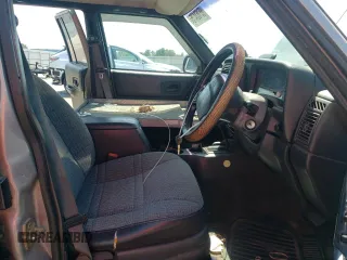 2000 Jeep Cherokee with VIN 1J4FN28S6YL210944, listed as a Copart auction lot 65163475 with 147,609 mi miles and Salvage title. Bid and sale history available at DreamBid. Image 7.