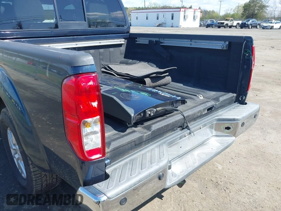 2016 Nissan Frontier SV z VIN 1N6AD0ER3GN754388, wystawiony jako IAAI lot #41971297 z przebiegiem 123 960 mil mil oraz . Historia ofert i sprzedaży dostępna na DreamBid. Obrazek 6.