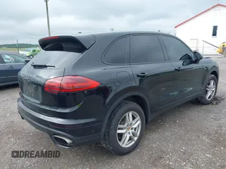 2016 Porsche Cayenne with VIN WP1AA2A28GLA10621, listed as a IAAI auction lot 42375924 with 70,815 mi miles and . Bid and sale history available at DreamBid. Image 4.