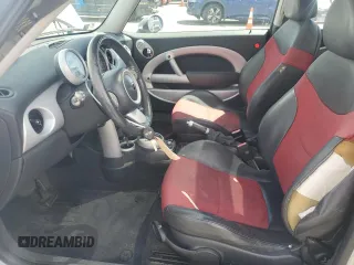 2005 MINI Hardtop z VIN WMWRC33405TJ64270, wystawiony jako Copart lot #52730515 z przebiegiem 99 702 mil mil oraz Szkoda całkowita • Salvage title. Historia ofert i sprzedaży dostępna na DreamBid. Obrazek 7.