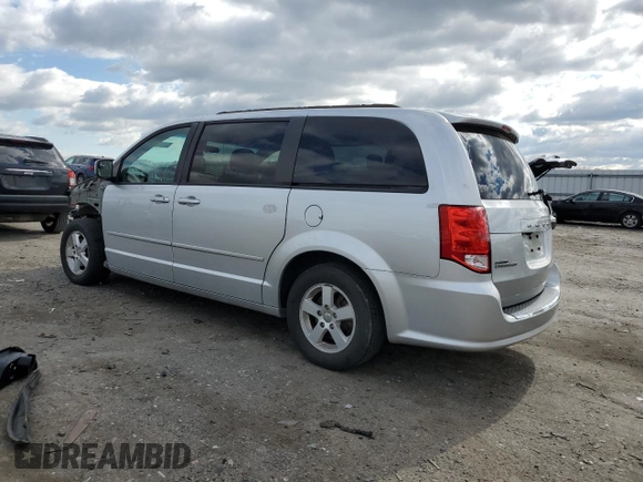 2012 Dodge Grand Caravan SXT with VIN 2C4RDGCG5CR327937, listed as a Copart auction lot 52905955 with 168,382 mi miles and Salvage Title. Bid and sale history available at DreamBid. Image 2.