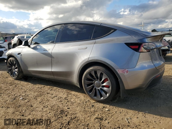 2024 Tesla Model Y Performance with VIN 7SAYGDEF2RF113873, listed as a Copart auction lot 46181915 with 19,625 mi miles and Salvage Title. Bid and sale history available at DreamBid. Image 2.