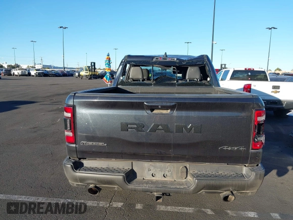 2019 Ram 1500 Rebel z VIN 1C6SRFLT2KN900600, wystawiony jako IAAI lot #41307832 z przebiegiem 74 481 mil mil oraz . Historia ofert i sprzedaży dostępna na DreamBid. Obrazek 16.