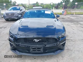 2022 Ford Mustang EcoBoost z VIN 1FATP8UH7N5124631, wystawiony jako IAAI lot #42322481 z przebiegiem 57 502 mil mil oraz . Historia ofert i sprzedaży dostępna na DreamBid. Obrazek 12.