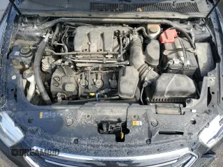 2014 Ford Taurus Limited z VIN 1FAHP2J88EG177883, wystawiony jako Copart lot #56119255 z przebiegiem 141 743 mil mil oraz Szkoda całkowita • Salvage title. Historia ofert i sprzedaży dostępna na DreamBid. Obrazek 11.