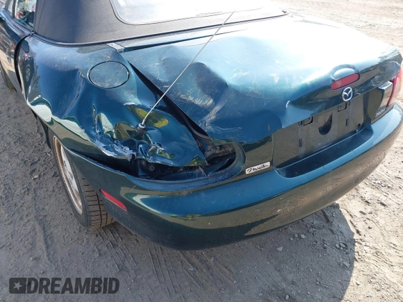 1999 Mazda MX-5 Miata with VIN JM1NB3537X0109618, listed as a IAAI auction lot 41795736 with 160,452 mi miles and . Bid and sale history available at DreamBid. Image 6.
