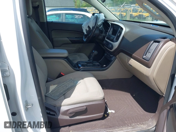 2019 GMC Canyon 4WD SLE z VIN 1GTG6CENXK1319647, wystawiony jako IAAI lot #42039568 z przebiegiem 56 371 mil mil oraz . Historia ofert i sprzedaży dostępna na DreamBid. Obrazek 5.