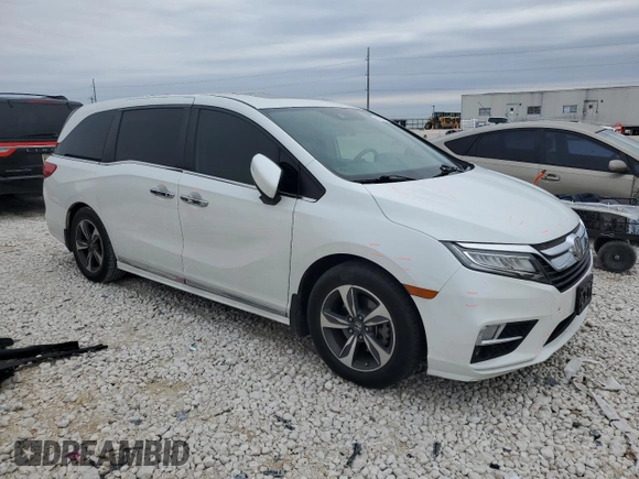2020 Honda Odyssey Touring with VIN 5FNRL6H88LB014164, listed as a Copart auction lot 42925415 with 67,667 mi miles and Salvage title. Bid and sale history available at DreamBid. Image 4.
