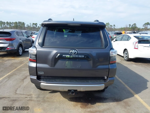 2021 Toyota 4Runner TRD Off Road with VIN JTEPU5JR0M5877962, listed as a IAAI auction lot 41683297 with 61,539 mi miles. Bid and sale history available at carsss.com. Image 16.