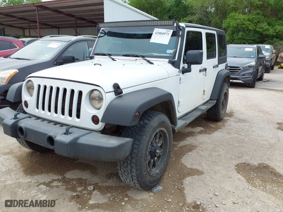 2013 Jeep Wrangler Unlimited Sport with VIN 1C4BJWDG8DL511315, listed as a IAAI auction lot 42004971 with 136,630 mi miles. Bid and sale history available at carsss.com. Image 17.