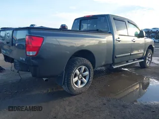 2010 Nissan Titan with VIN 1N6BA0FC1AN320629, listed as a IAAI auction lot 42491569 with 169,819 mi miles and . Bid and sale history available at DreamBid. Image 4.
