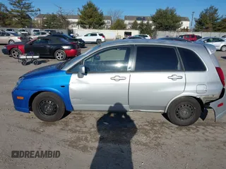 2004 Suzuki Aerio SX z VIN JS2RC61H345252846, wystawiony jako IAAI lot #41326143 z przebiegiem 110 563 mil mil oraz . Historia ofert i sprzedaży dostępna na DreamBid. Obrazek 14.