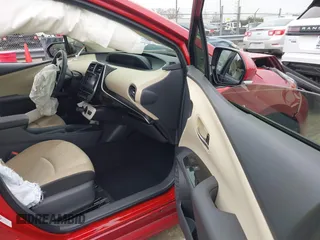2016 Toyota Prius Four z VIN JTDKARFU5G3507831, wystawiony jako IAAI lot #41621652 z przebiegiem 76 024 mil mil oraz . Historia ofert i sprzedaży dostępna na DreamBid. Obrazek 5.