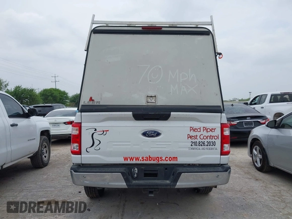 2021 Ford F-150 XL with VIN 1FTMF1CB7MKE81507, listed as a IAAI auction lot 41903595 with 71,860 mi miles and . Bid and sale history available at DreamBid. Image 16.