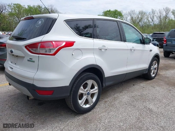 2013 Ford Escape SE with VIN 1FMCU0GX7DUB24877, listed as a IAAI auction lot 42038426 with 126,207 mi miles. Bid and sale history available at carsss.com. Image 4.