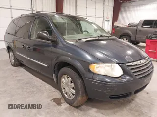 2007 Chrysler Town & Country LWB Touring with VIN 2A4GP54LX7R123648, listed as a IAAI auction lot 41532469 with 172,287 mi miles. Bid and sale history available at carsss.com. Image 1.