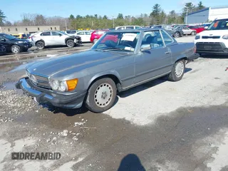 1987 Mercedes-Benz 560 Series 560SL with VIN WDBBA48D0HA074673, listed as a IAAI auction lot 41900883 with 79,107 mi miles. Bid and sale history available at carsss.com. Image 2.