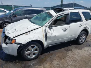 2011 Ford Escape Limited with VIN 1FMCU9EG5BKB08855, listed as a IAAI auction lot 42073027 with 145,471 mi miles and . Bid and sale history available at DreamBid. Image 12.