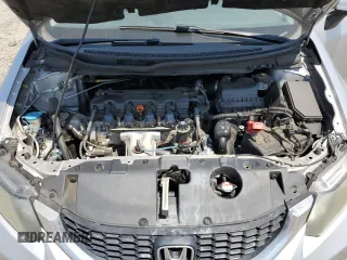 2014 Honda Civic LX z VIN 19XFB2F5XEE243221, wystawiony jako Copart lot #59990585 z przebiegiem 245 617 mil mil oraz Czysty tytuł • Clean title. Historia ofert i sprzedaży dostępna na DreamBid. Obrazek 11.