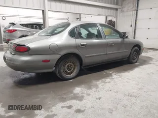 1999 Ford Taurus LX Standard with VIN 1FAFP52U0XG308165, listed as a IAAI auction lot 42509140 with 238,920 mi miles and . Bid and sale history available at DreamBid. Image 4.