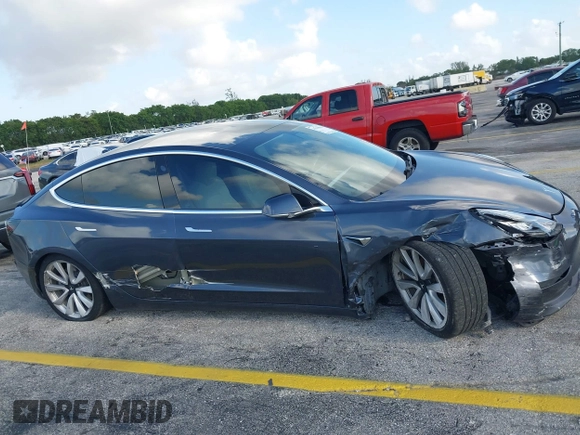2020 Tesla Model 3 Standard Range Plus with VIN 5YJ3E1EA0LF744046, listed as a IAAI auction lot 41939894 with 102,576 mi miles. Bid and sale history available at carsss.com. Image 6.