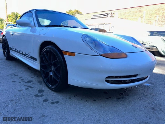 1999 Porsche 911 Carrera with VIN WP0CA299XXS652517, listed as a Copart auction lot 78445124 with 71,731 mi miles and Clean Title. Bid and sale history available at carsss.com. Image 1.