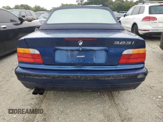 1999 BMW 3 Series 323icA with VIN WBABJ8333XEM23157, listed as a Copart auction lot 74237224 with 0 mi miles and Salvage Title. Bid and sale history available at carsss.com. Image 6.