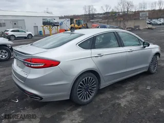 2018 Ford Fusion Titanium with VIN 3FA6P0D99JR139114, listed as a IAAI auction lot 41991248 with 142,324 mi miles. Bid and sale history available at carsss.com. Image 4.