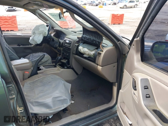 2004 Jeep Grand Cherokee Laredo with VIN 1J4GX48S34C192181, listed as a IAAI auction lot 42320368 with 181,415 mi miles and . Bid and sale history available at DreamBid. Image 5.
