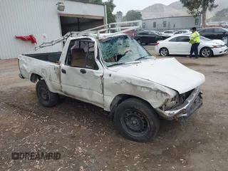 1989 Toyota Pickup DX z VIN JT4RN81P9K0023637, wystawiony jako IAAI lot #42498482 z przebiegiem 218 937 mil mil oraz . Historia ofert i sprzedaży dostępna na DreamBid. Obrazek 1.