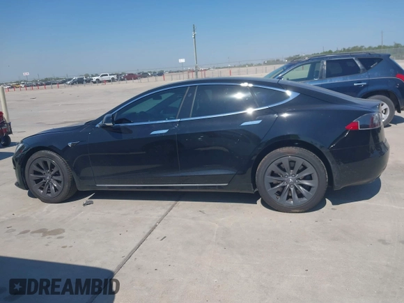 2020 Tesla Model S Long Range with VIN 5YJSA1E27LF397346, listed as a IAAI auction lot 40579015 with 43,779 mi miles and . Bid and sale history available at DreamBid. Image 14.