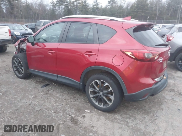 2016 Mazda CX-5 Grand Touring with VIN JM3KE4DY6G0740347, listed as a IAAI auction lot 41101437 with 81,586 mi miles. Bid and sale history available at carsss.com. Image 3.
